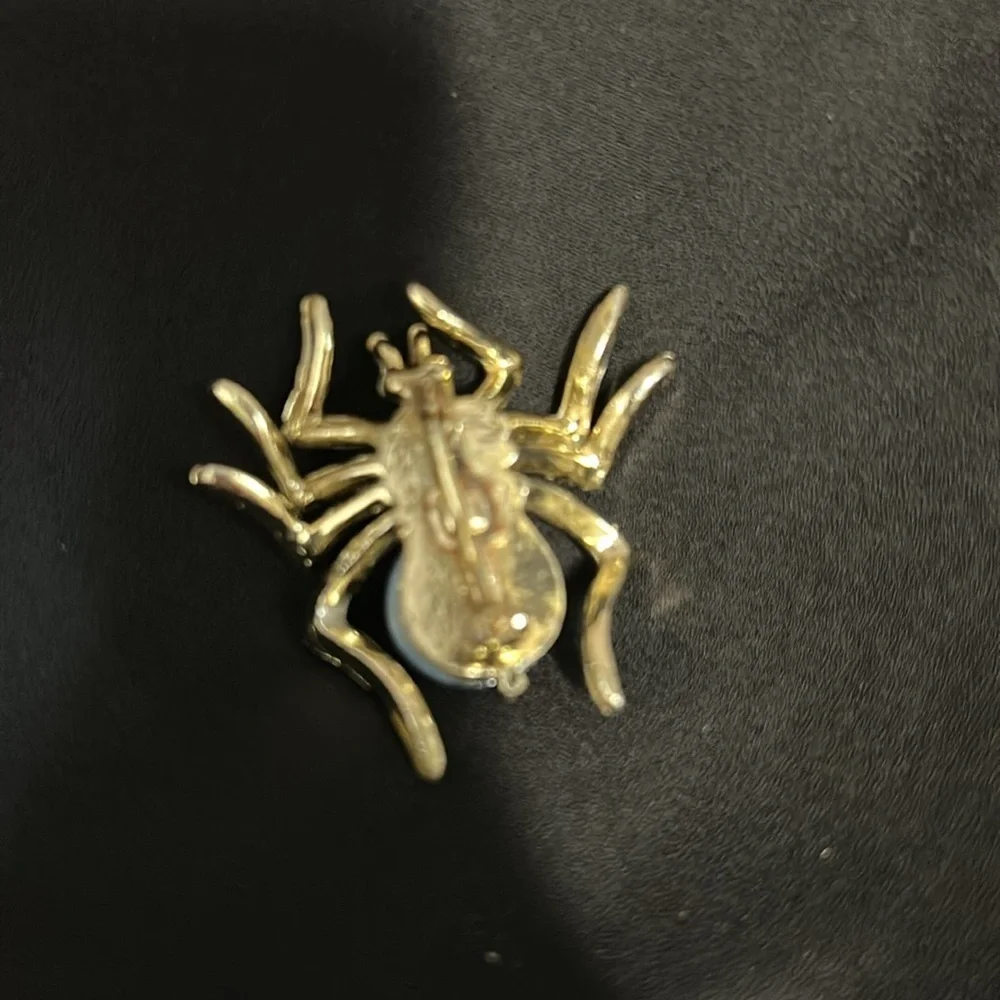 Elegant Gold and Blue Spider Brooch